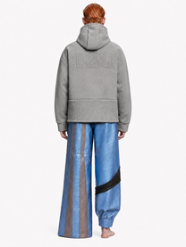 ORION VEIL(MEN) ：Asymmetric Metallic Leather Hybrid Trousers