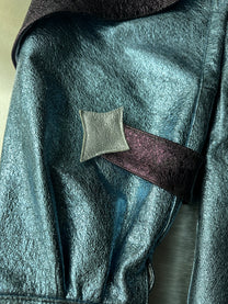 ORION VEIL(MEN) ：Asymmetric Metallic Leather Hybrid Trousers