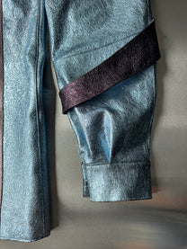 ORION VEIL(MEN) ：Asymmetric Metallic Leather Hybrid Trousers
